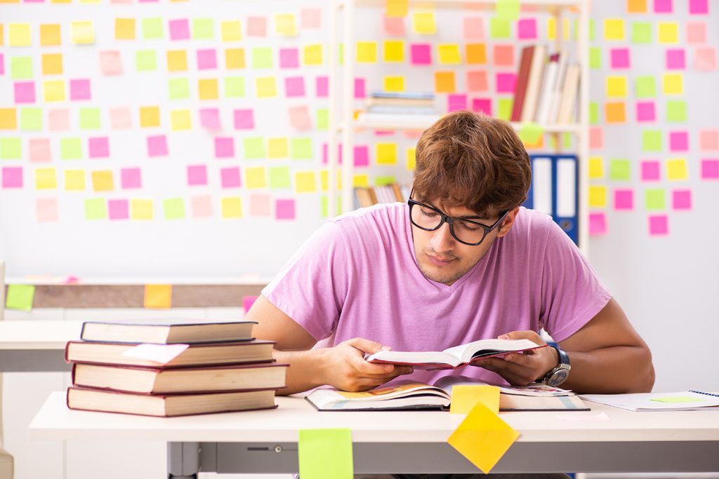 student reading books